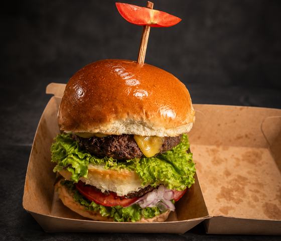 Cheeseburger in a takeaway box